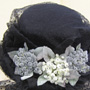 Hat with grey berries